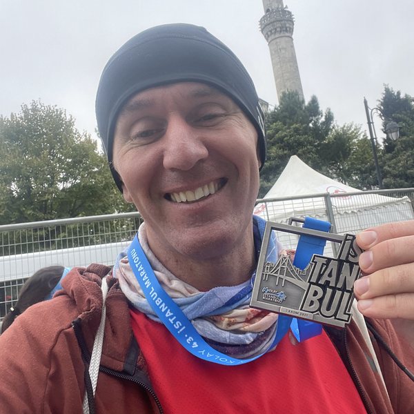 A medalha. E aquele sorriso.